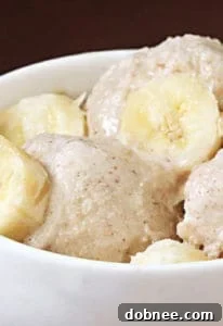 Spiced Banana & Brown Sugar Ice Cream in a bowl with a spoon