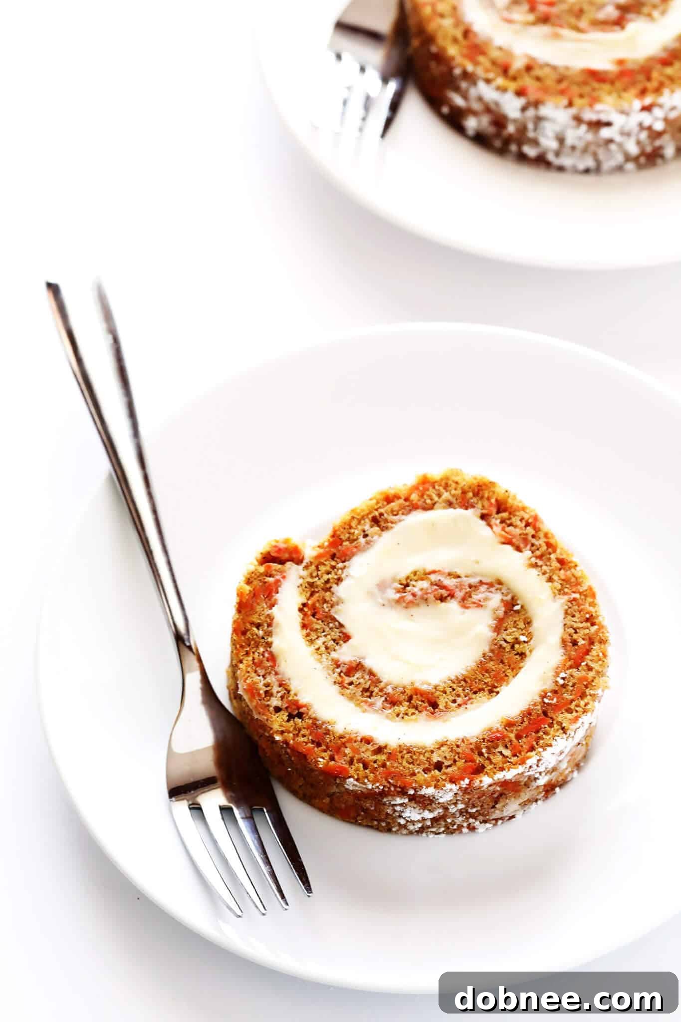 Everything you love about carrot cake...rolled up into this easy Carrot Cake Roll dessert!! So easy to make, and so delicious! | gimmesomeoven.com