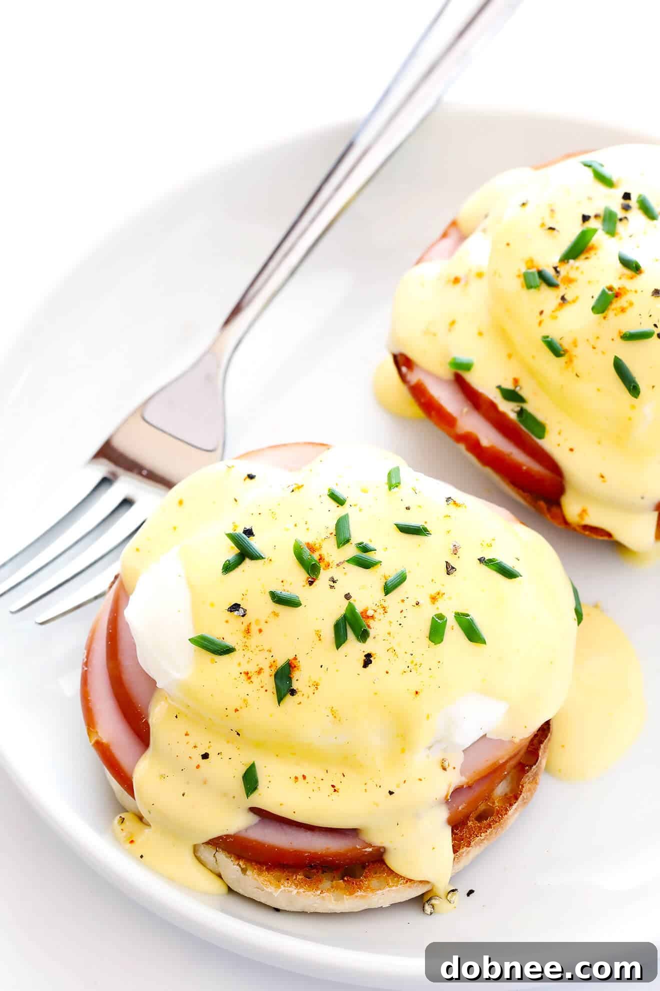 This Blender Hollandaise Sauce recipe is the perfect topping for classic Eggs Benedict! One of my all-time favorite recipes for breakfast or brunch! | gimmesomeoven.com