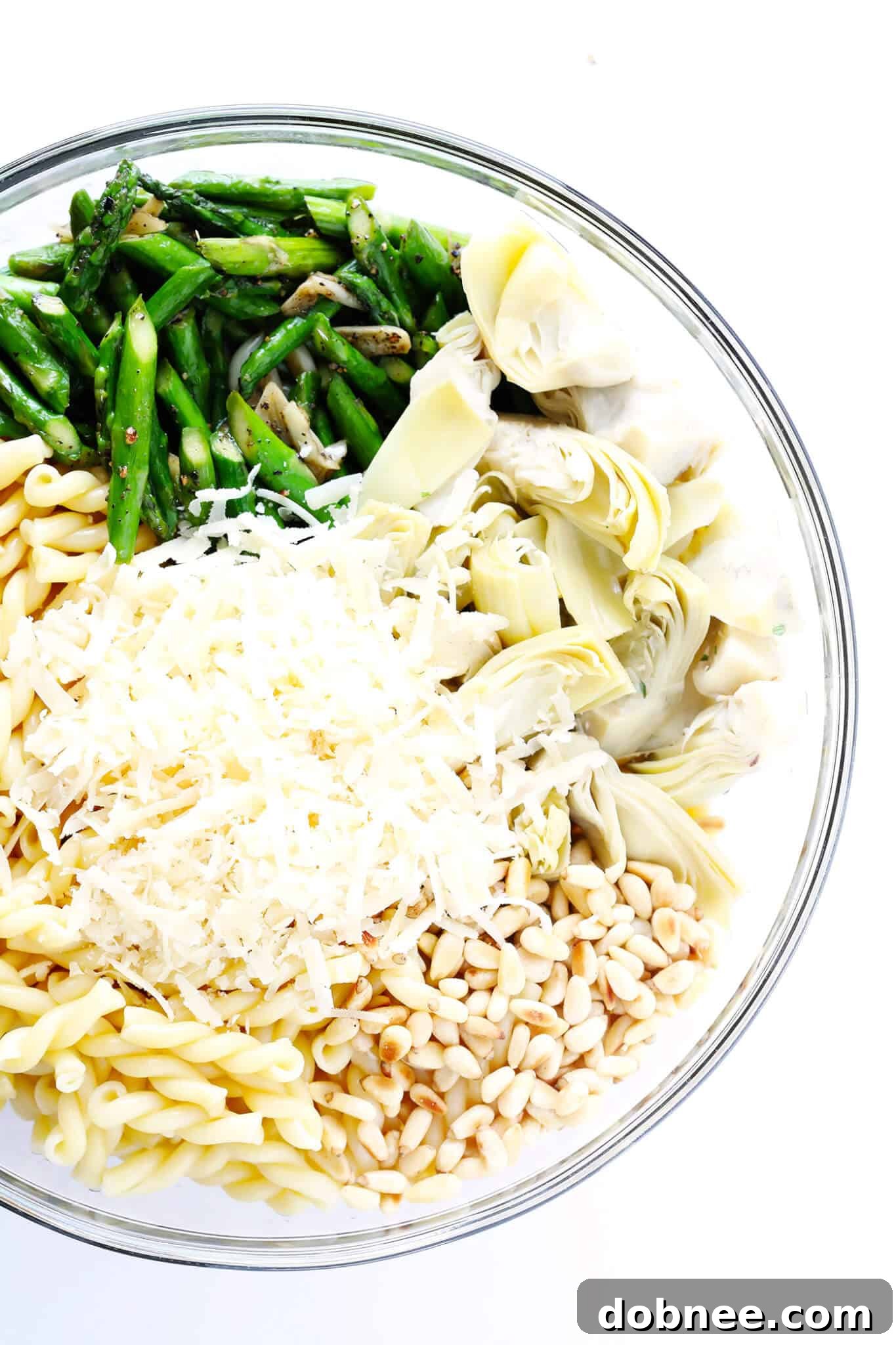 A vibrant and refreshing Lemony Artichoke Pasta Salad, perfect for spring and summer gatherings, featuring fresh ingredients and a zesty dressing.