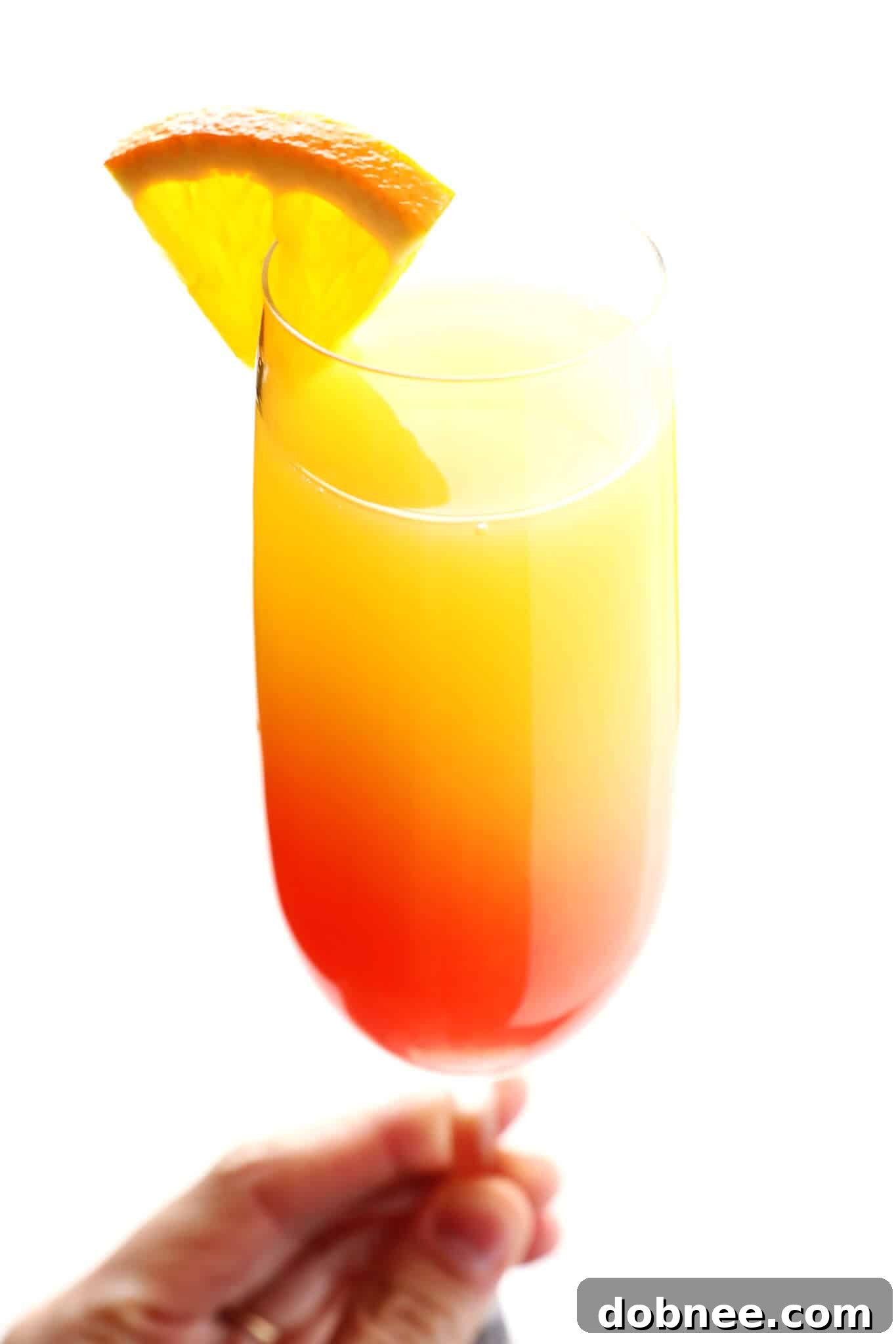 Agave Dawn Mimosa 7 Two Tequila Sunrise Mimosas on a table, ready to be enjoyed.