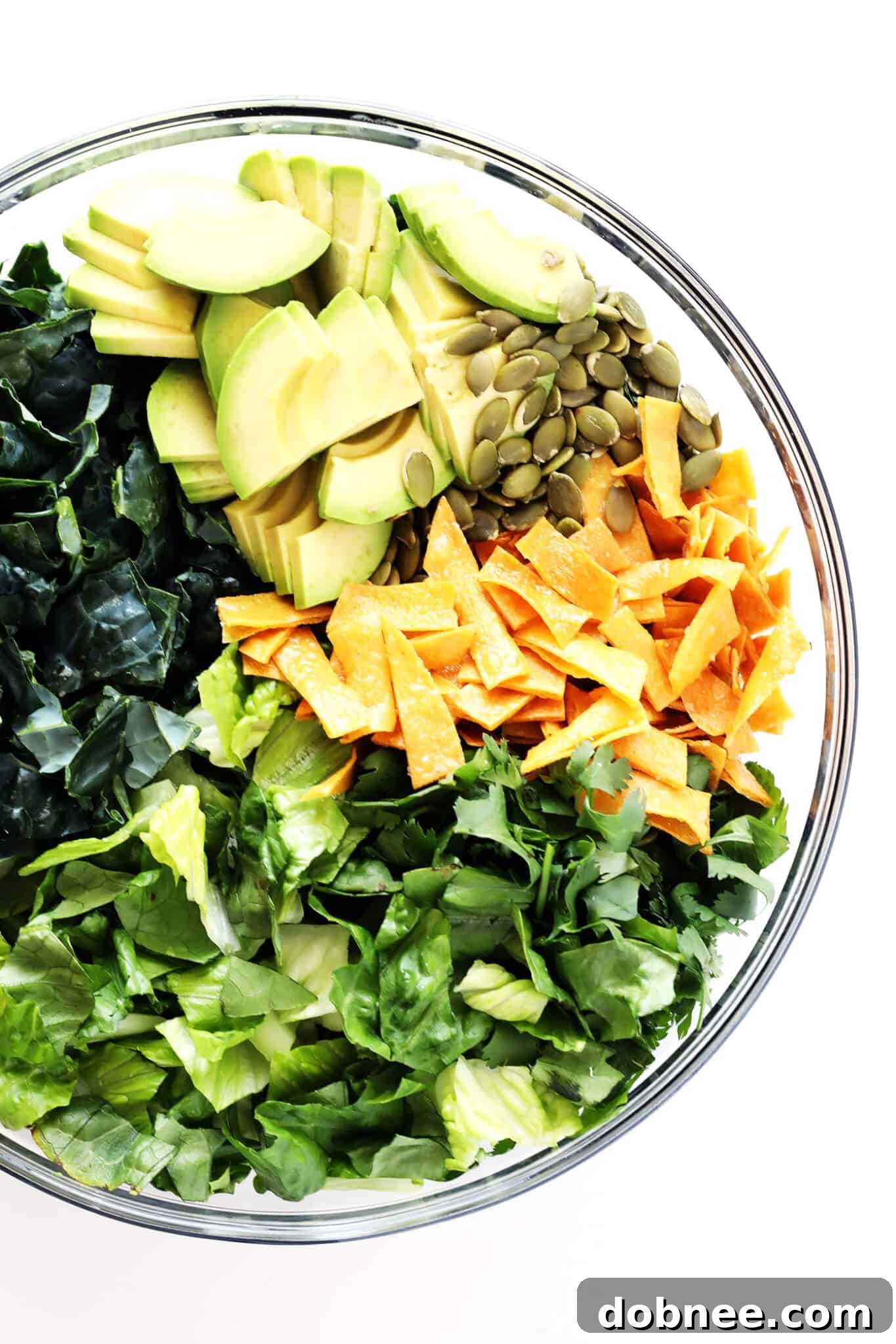 Indulge in this hearty and healthy Mexican Caesar Salad, featuring a lighter Greek Yogurt Caesar Dressing, making it an incredibly satisfying and delicious meal.