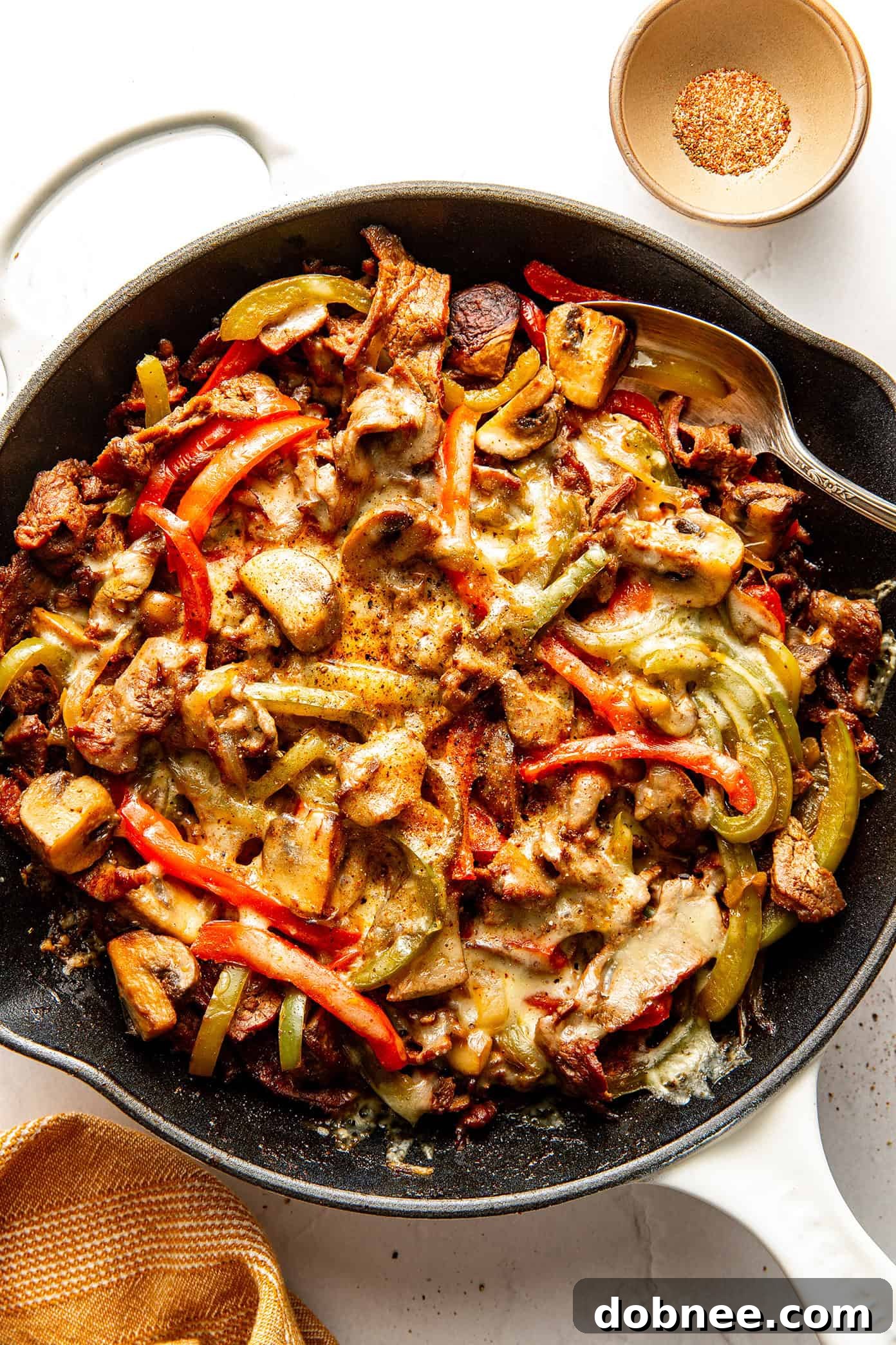 Zesty Philly Cheesesteak Skillet, a delicious recipe featuring bell peppers.