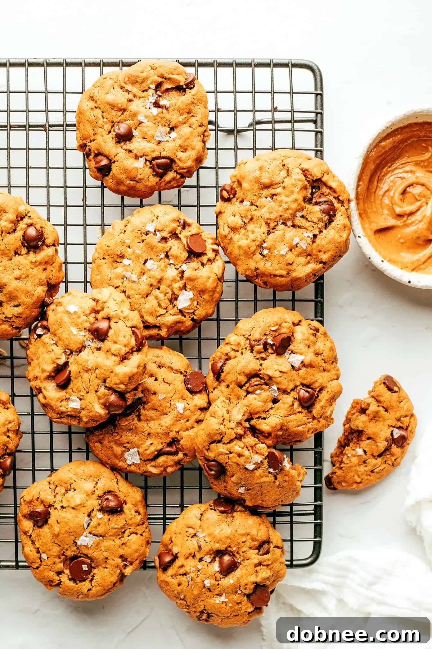 Healthy Peanut Butter Cookies fresh from the oven, garnished with flaky sea salt