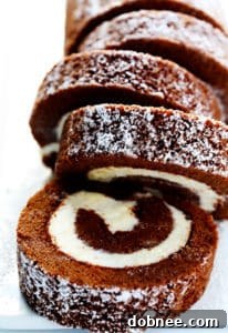 Delicious Chocolate Swiss Roll with powdered sugar