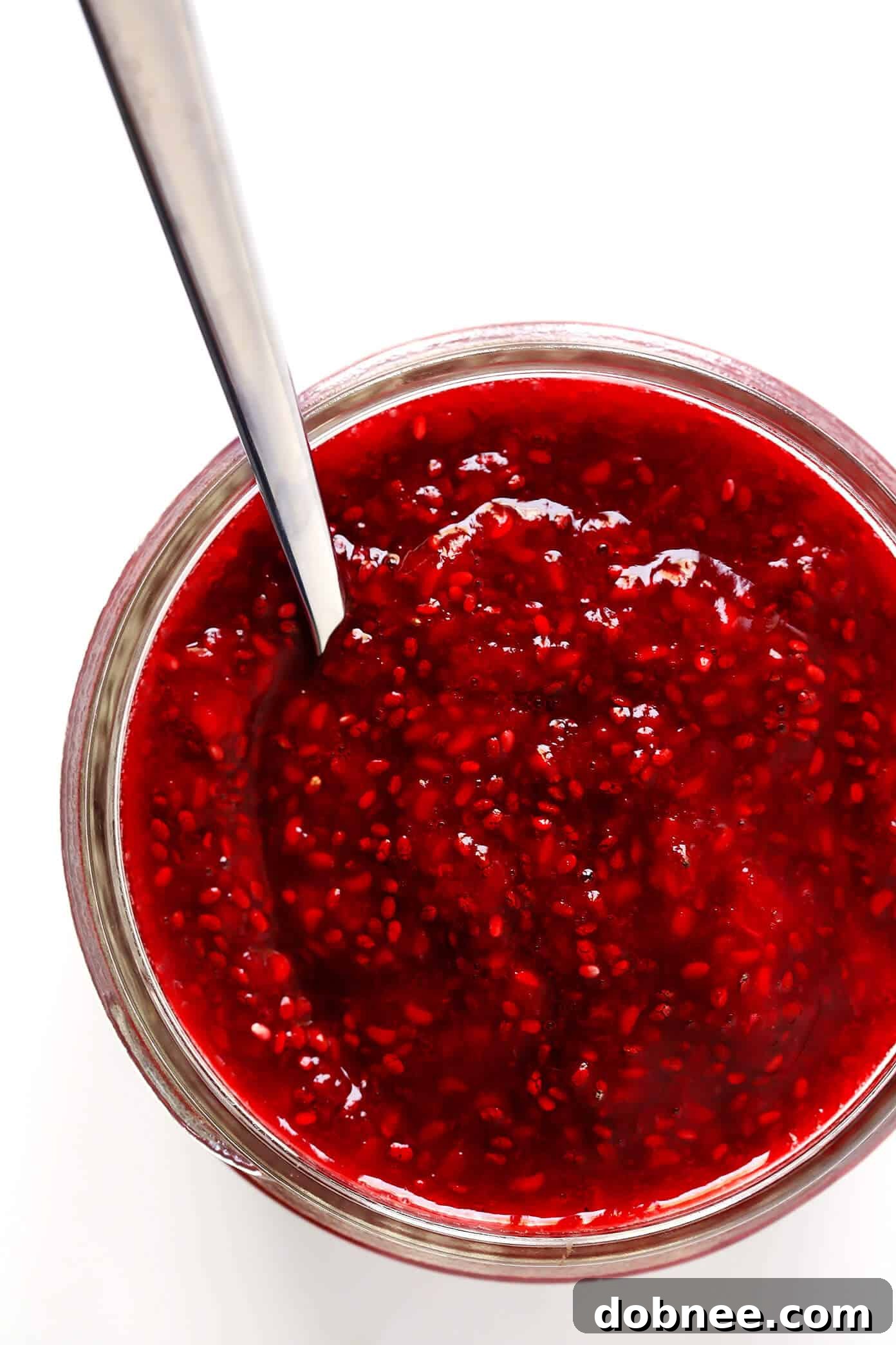 This 10-Minute Chia Seed Jam recipe is super easy to make, it's made with just 1 tablespoon of honey (instead of tons of added sugars!), it's perfect for breakfasts (toast, parfaits, etc.), sandwiches, cookies, and more, and it's SO delicious! Feel free to make it with your favorite juicy fruit (such as strawberry, blackberry, raspberry, peach, etc.).