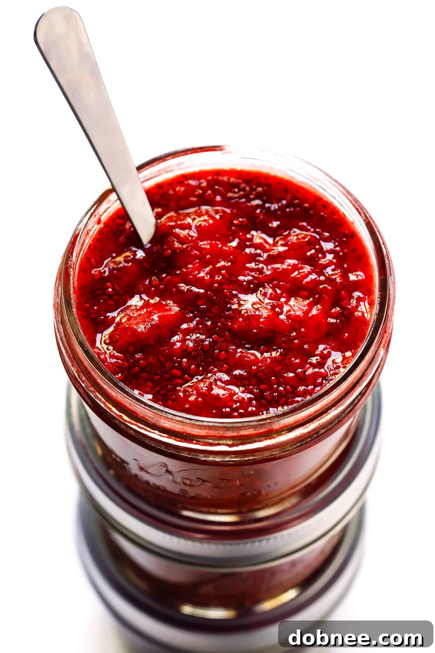 This 10-Minute Chia Seed Jam recipe is super easy to make, it's made with just 1 tablespoon of honey (instead of tons of added sugars!), it's perfect for breakfasts (toast, parfaits, etc.), sandwiches, cookies, and more, and it's SO delicious! Feel free to make it with your favorite juicy fruit (such as strawberry, blackberry, raspberry, peach, etc.).
