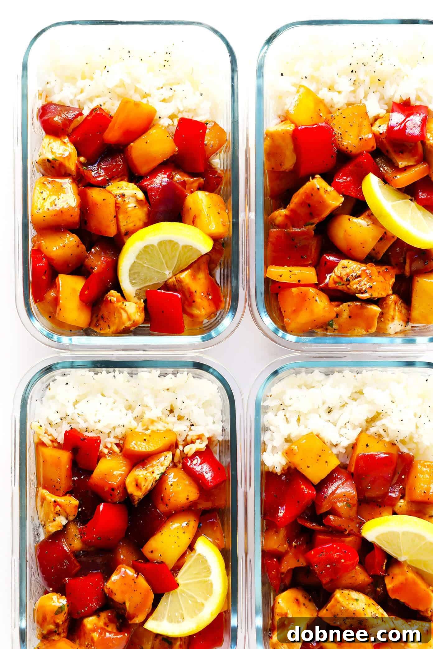 Delicious Hawaiian BBQ Chicken Bowls, perfect for meal prep or a quick weeknight dinner. Made with succulent chicken, fresh pineapple, and vibrant bell peppers, all coated in a tangy BBQ sauce.