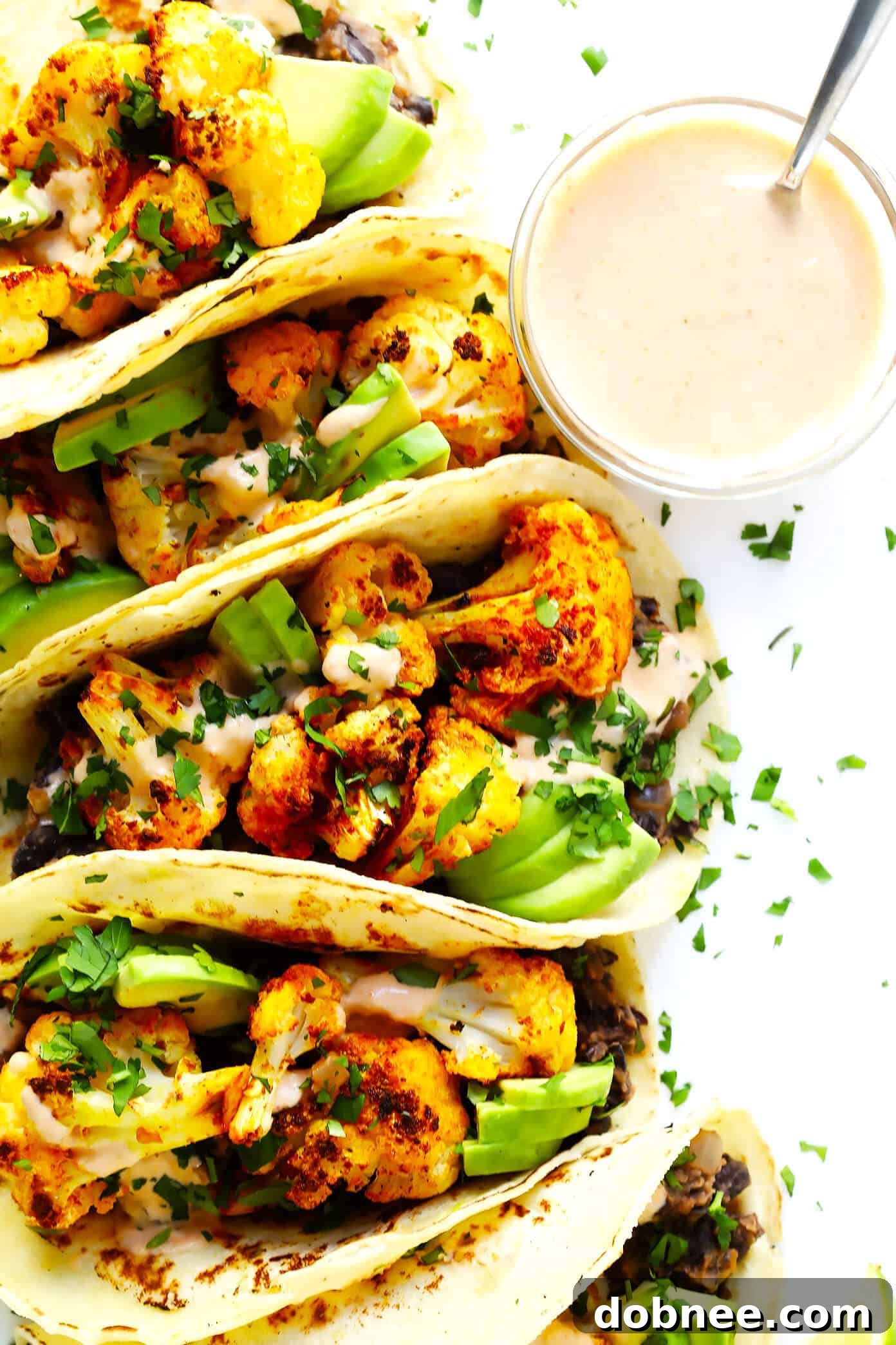 Gourmet Roasted Cauliflower and Black Bean Tacos with Tahini Crema