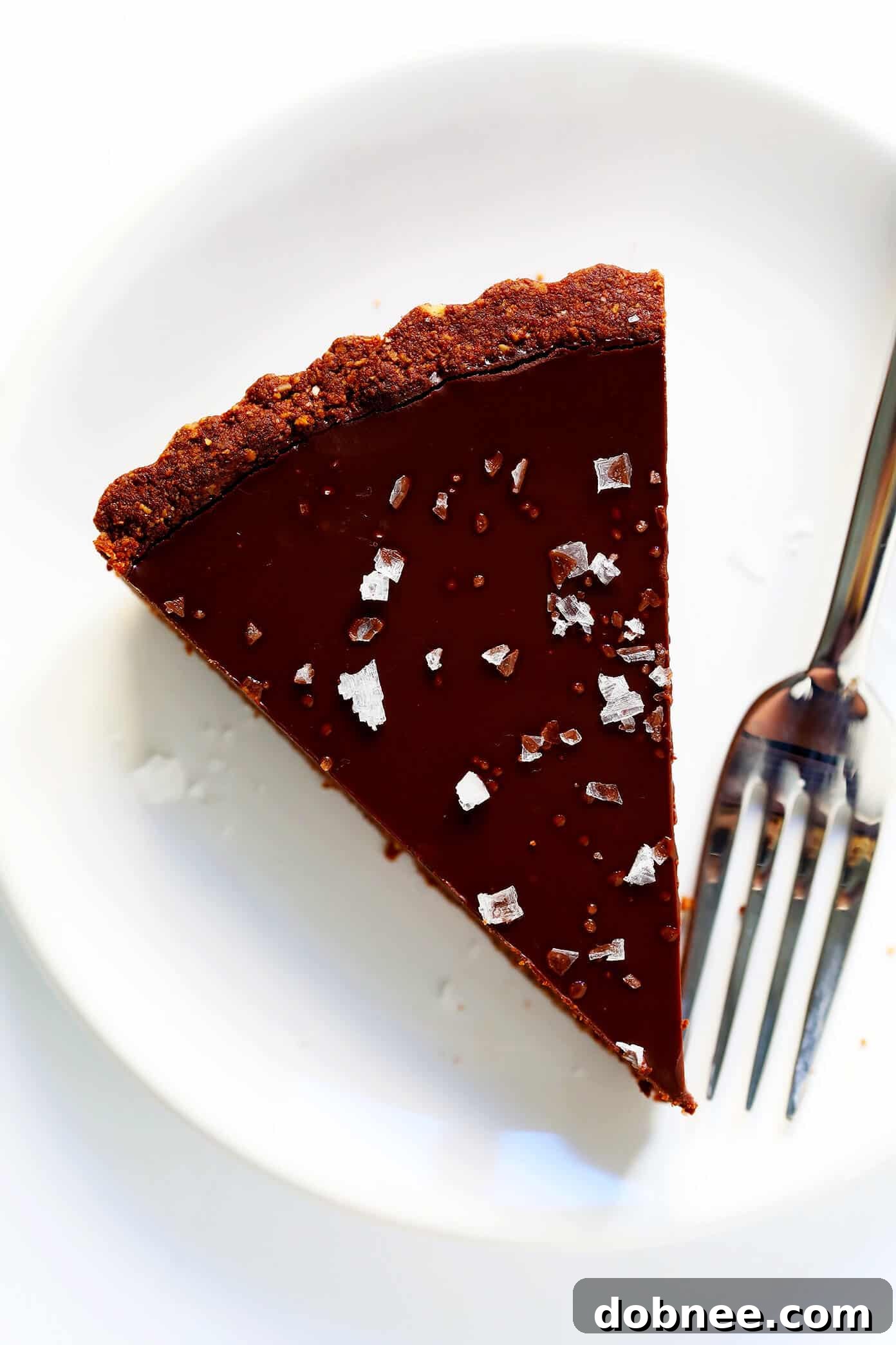 Vegan Dark Chocolate Tart Sliced and Ready to Serve