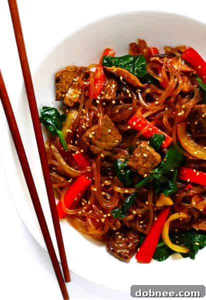 A smaller, focused image of the Japchae recipe, highlighting the overall presentation within a recipe card layout.