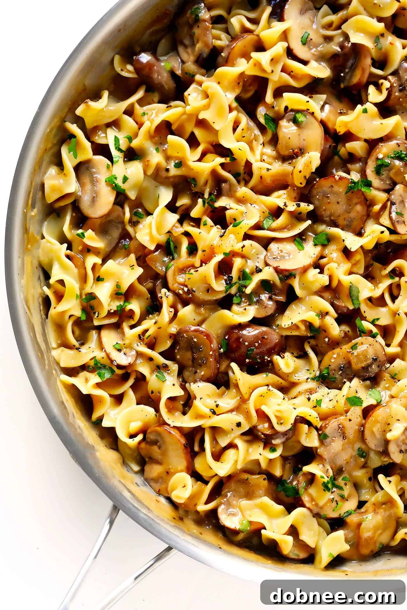 Vegetarian Mushroom Stroganoff in pan, showcasing its rich, creamy texture and delicious mushrooms.