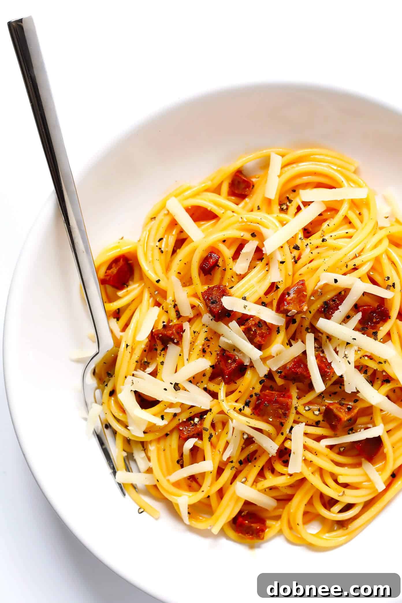 A vibrant bowl of Spanish Chorizo Spaghetti Carbonara, showcasing the rich colors of chorizo and creamy sauce