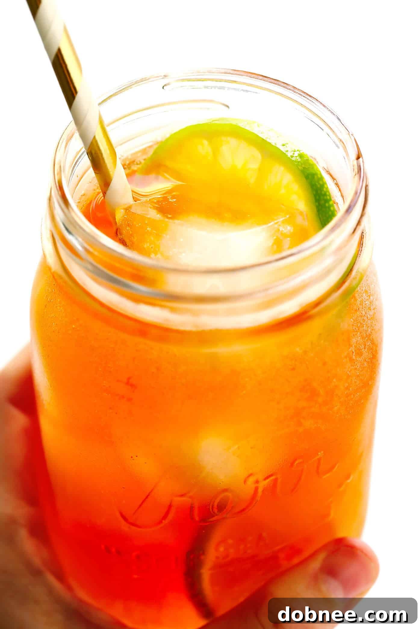 The ultimate refreshing Horsefeather Cocktail with whiskey, ginger beer, bitters, and lime