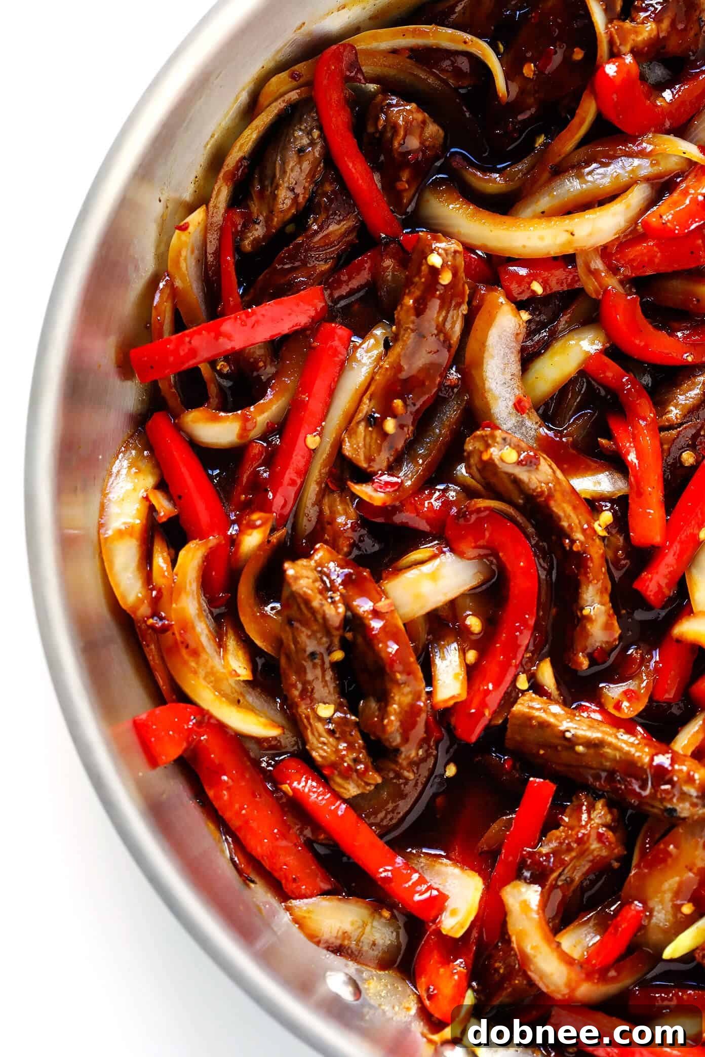 Szechuan Beef Stir-Fry with glossy Szechuan sauce and fresh ingredients.