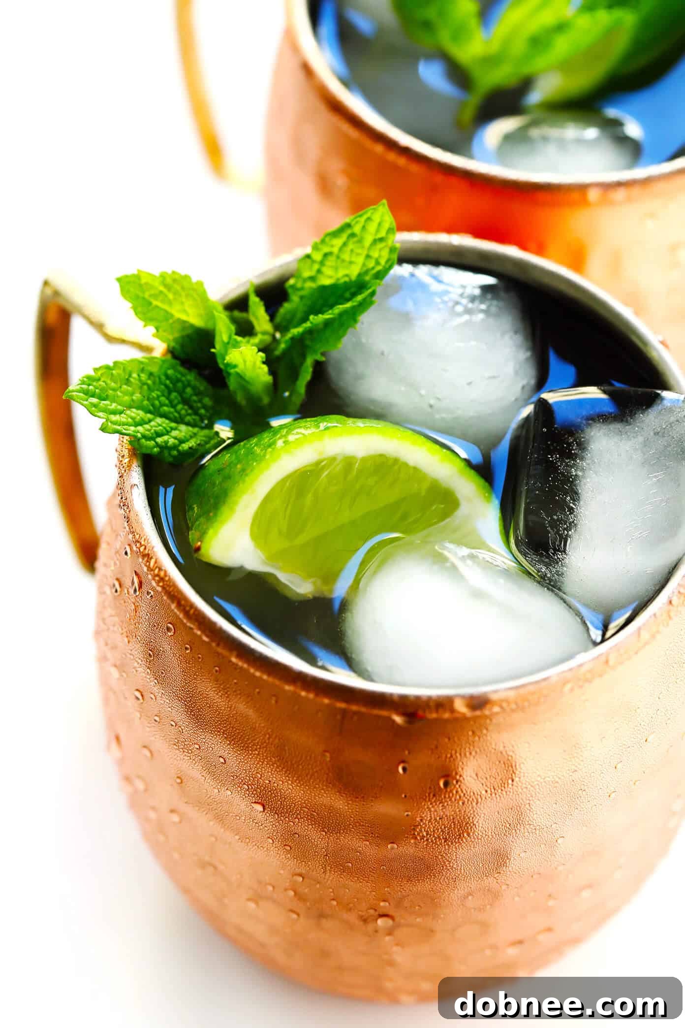 Craft the best Moscow Mule with spicy ginger beer, crisp vodka, and fresh lime in a classic copper mug for a refreshing cocktail.