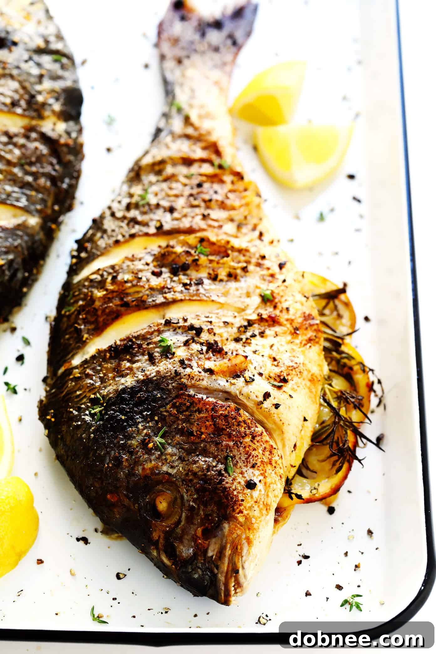 Discover the best oven-baked whole fish recipe, guaranteed to deliver perfectly cooked, flavorful fish with a crispy skin and juicy interior. The Best Oven Baked Whole Fish Recipe