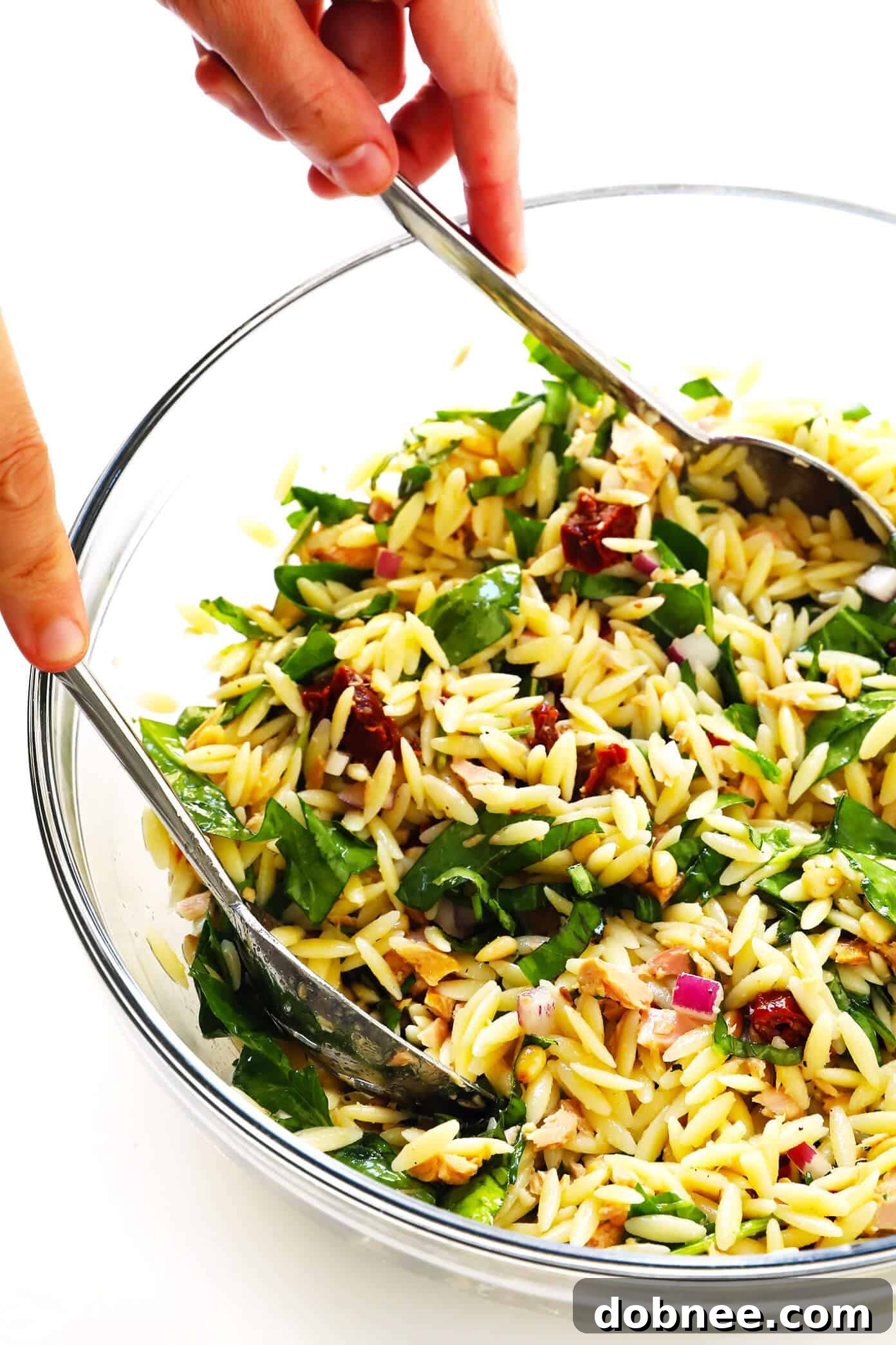 Step-by-step process for making Italian Orzo Tuna Salad: cooking pasta, whisking dressing, and combining fresh ingredients in a bowl.