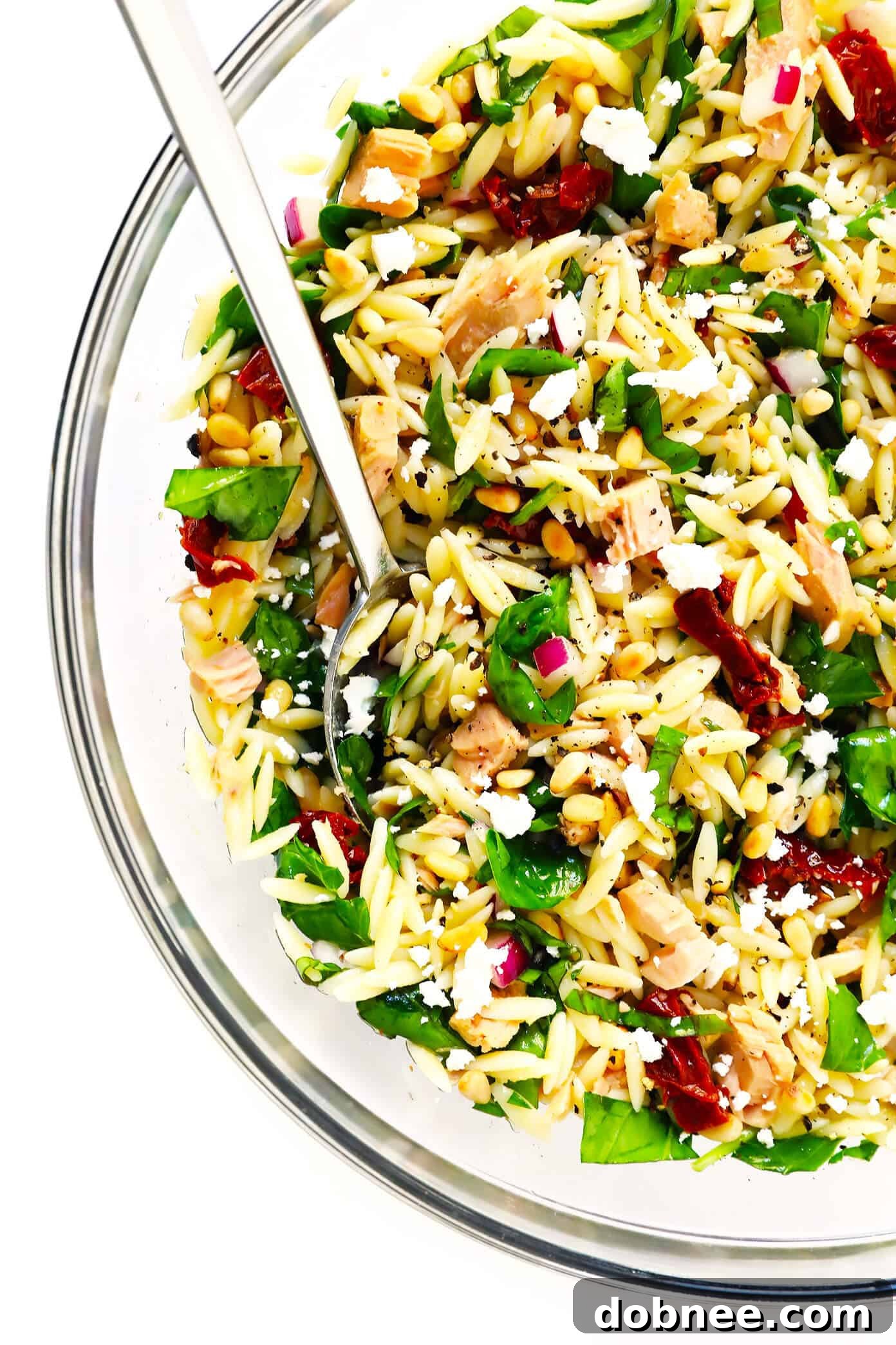 Italian Orzo Tuna Salad with Sun-Dried Tomatoes, Spinach, and Feta — a vibrant, healthy, and satisfying meal.