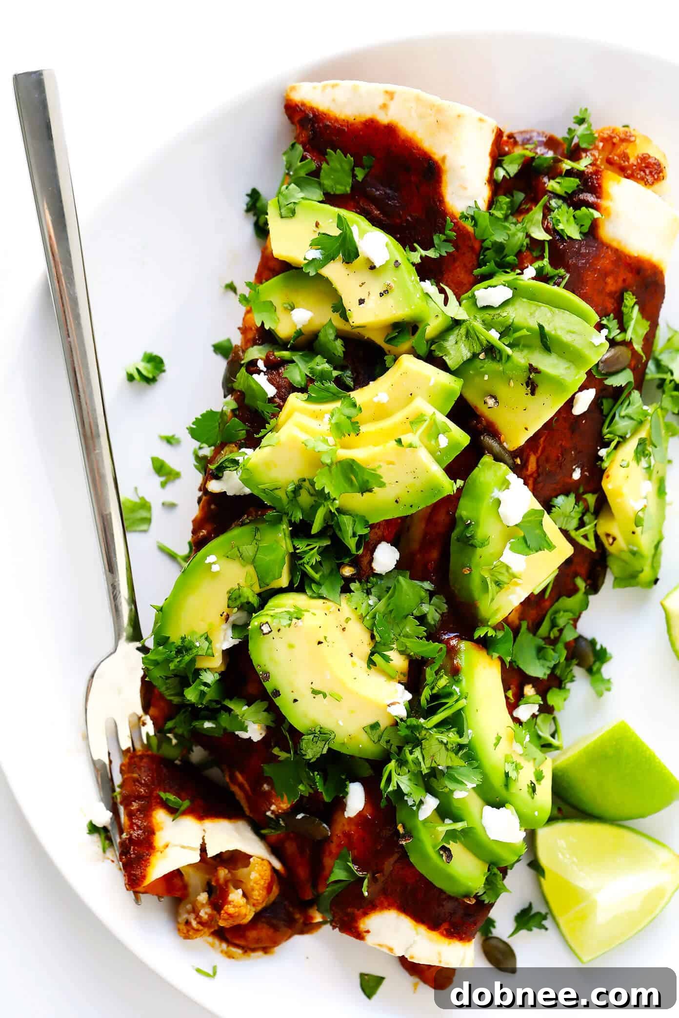 Vegetarian Roasted Cauliflower Enchiladas Recipe with Avocado and Cilantro
