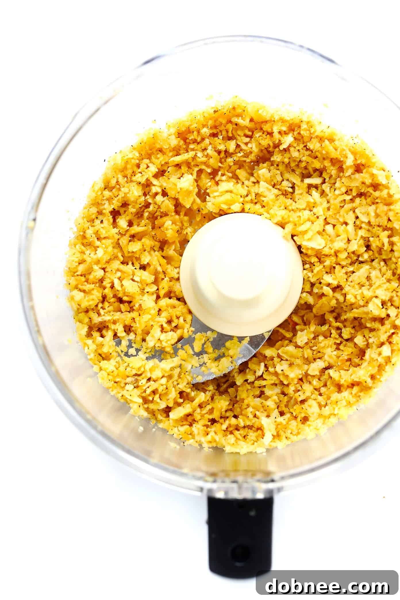 Simple ingredients for Ultra-Crispy Baked Chicken Nuggets: crushed Kettle Chips, chicken, and eggs