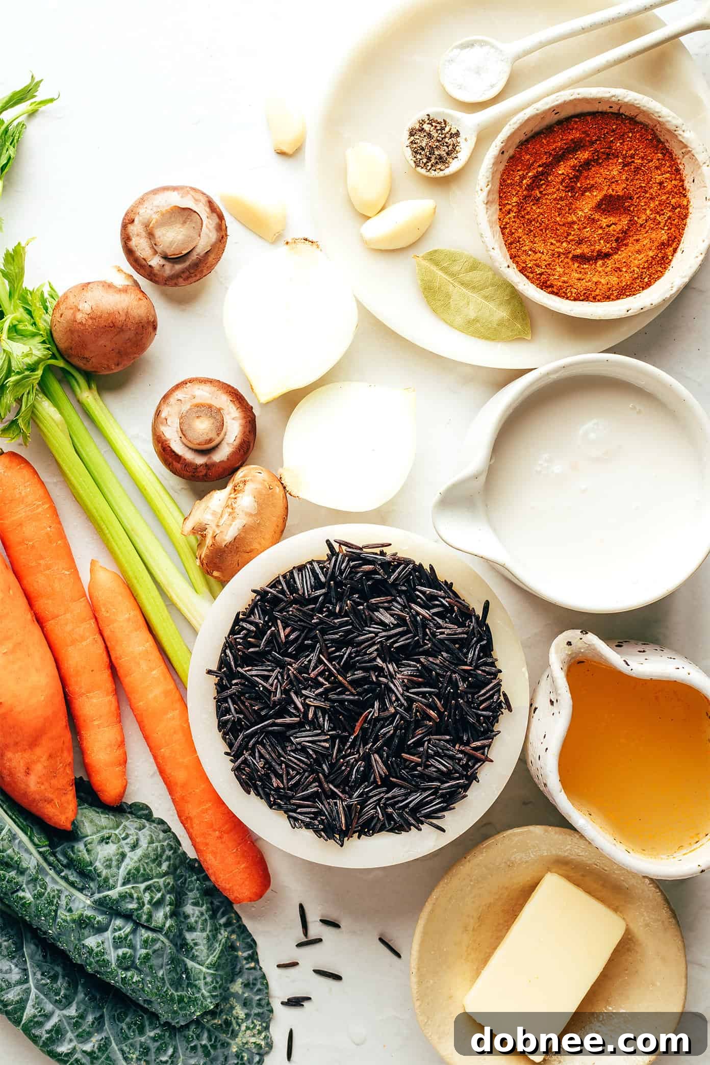 Close-up of creamy autumn wild rice soup in a bowl with a spoon