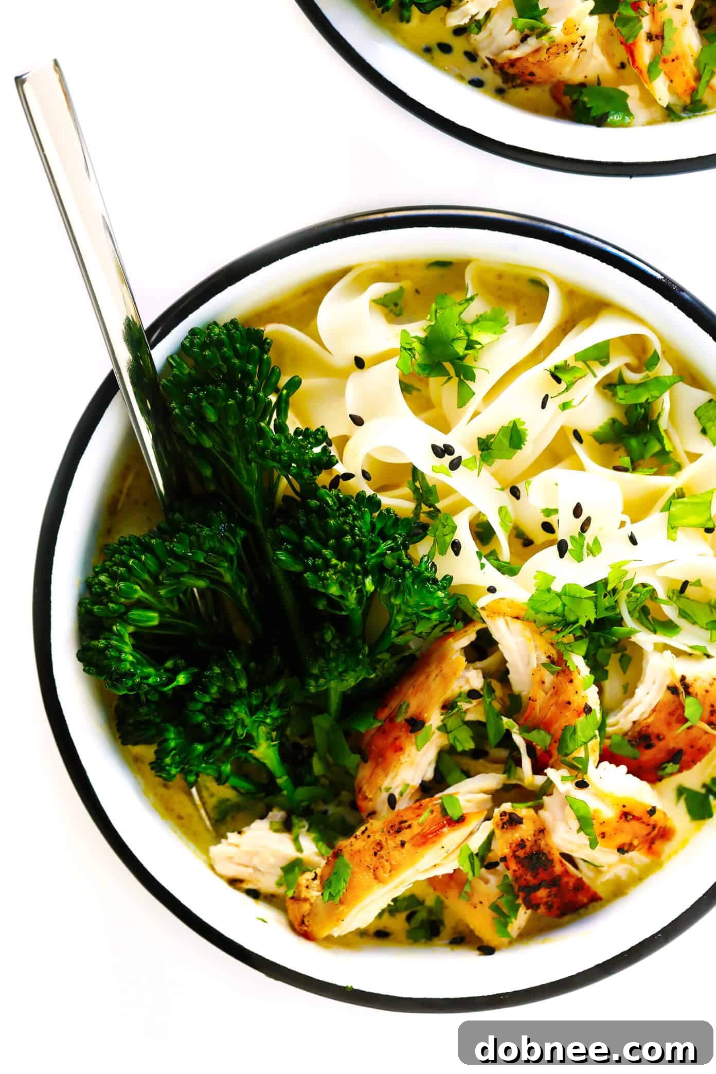 A beautifully plated bowl of everyday Thai Green Curry, garnished with fresh herbs and chili, ready to be enjoyed