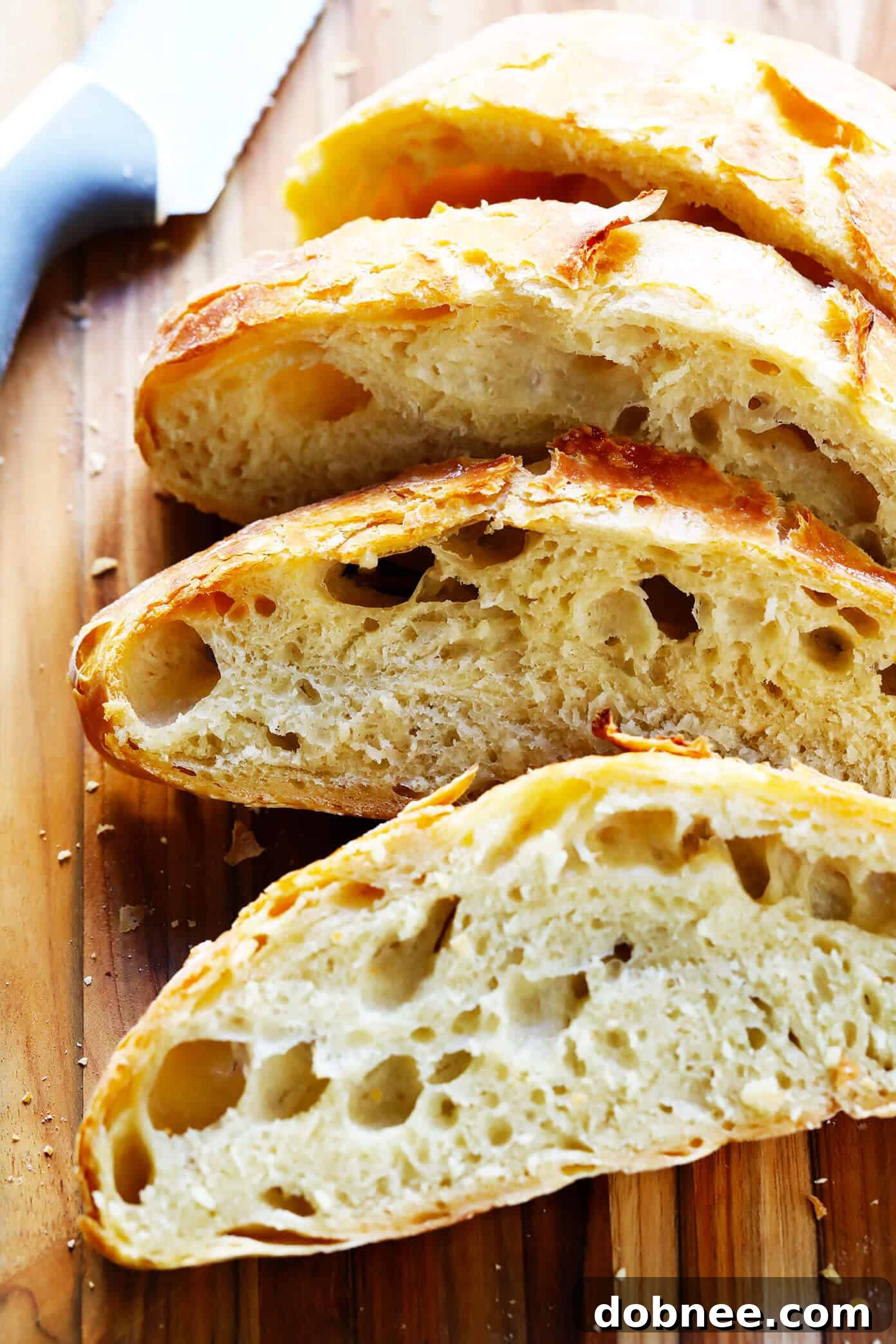 Rustic, homemade No Knead Bread, incredibly easy to make with a perfectly crusty golden exterior and a soft, flavorful interior, with options for traditional overnight rise or a faster 1.5-hour rise.