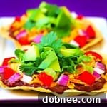 Chicken Tostadas ready to eat with fresh toppings