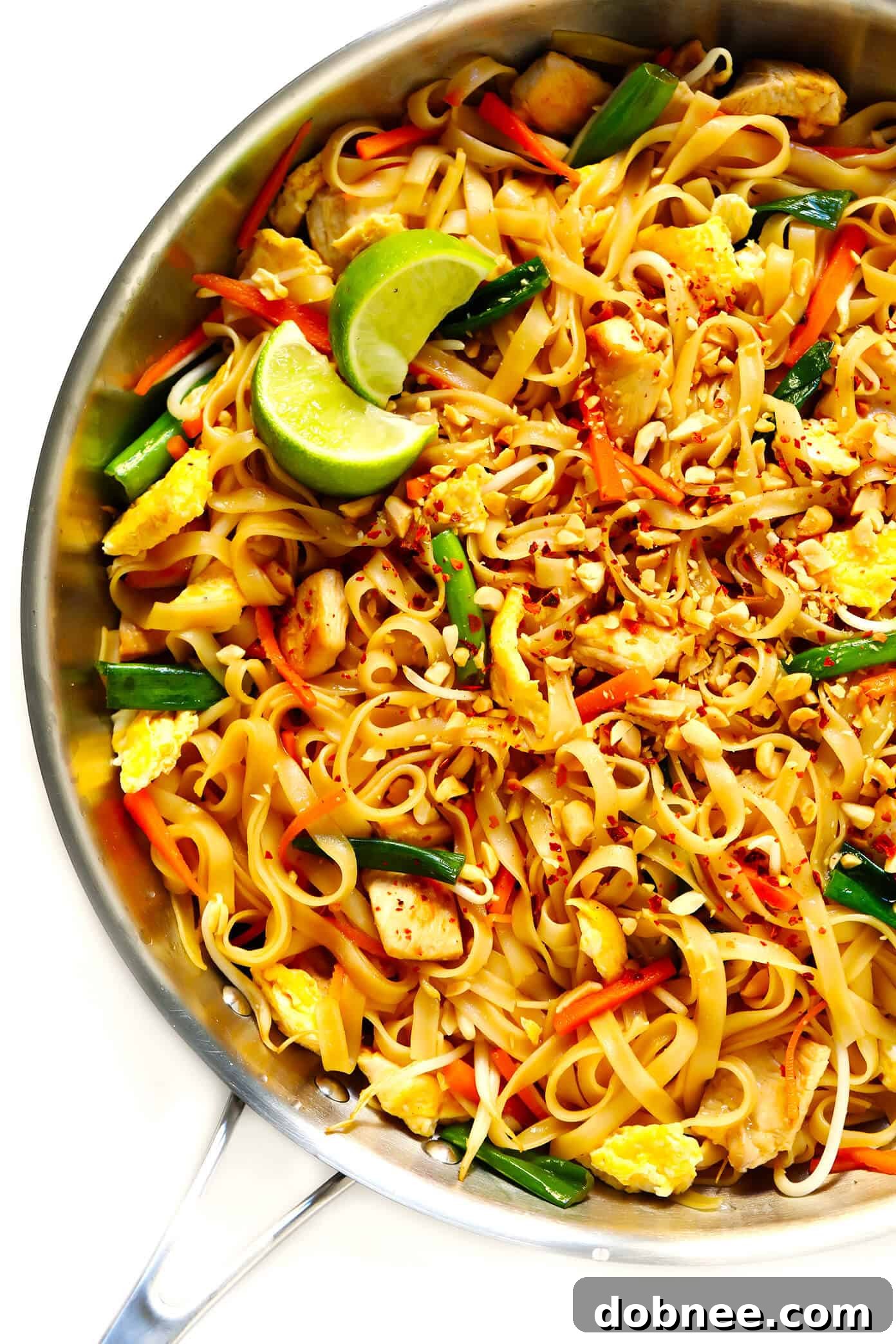 Delicious Homemade Pad Thai with Chicken and Fresh Toppings