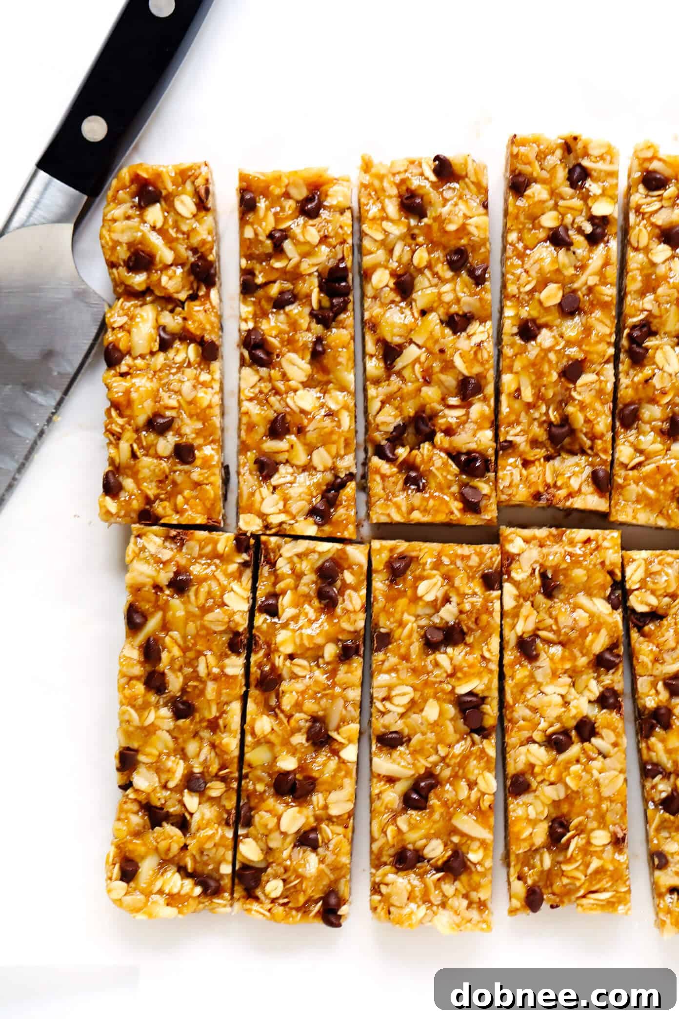 Close-up of healthy homemade granola bars, showcasing the hearty texture and rich ingredients.