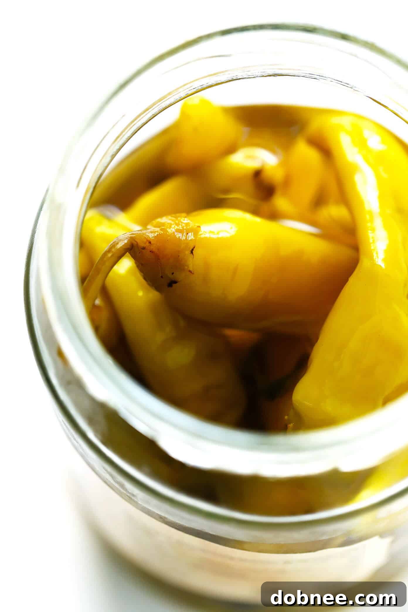 Close-up of vibrant yellow-green pepperoncini peppers