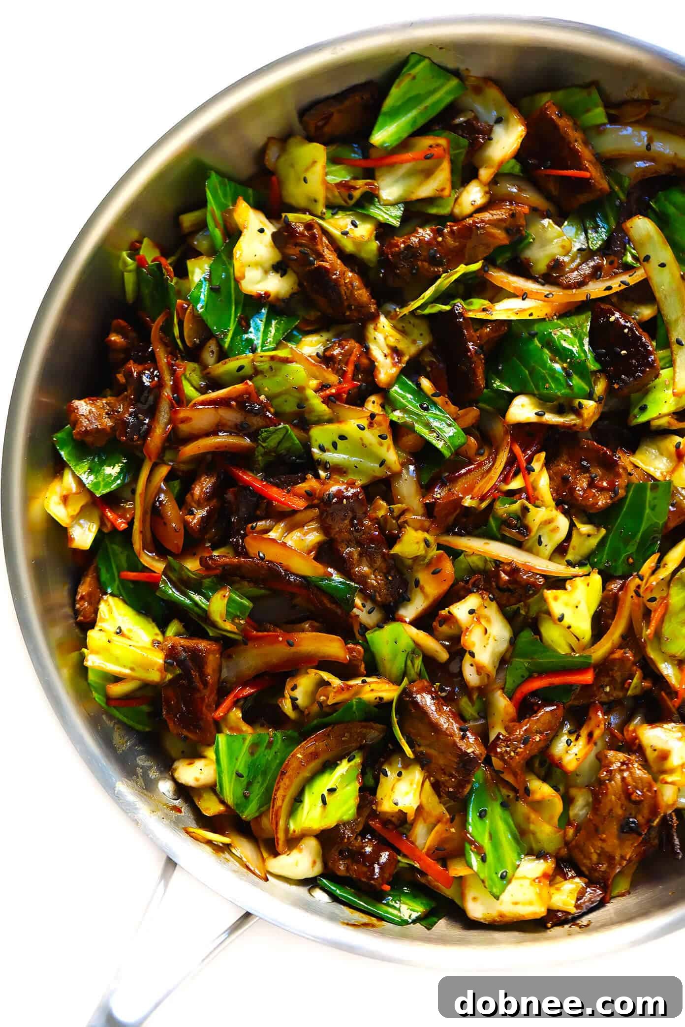 Closeup of Sesame Beef and Cabbage Stir-Fry ingredients in a pan