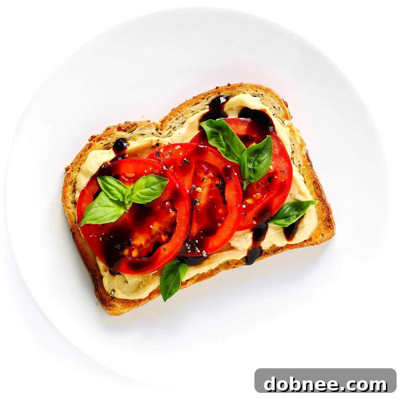 Tomato Basil Hummus Toast with Balsamic Glaze