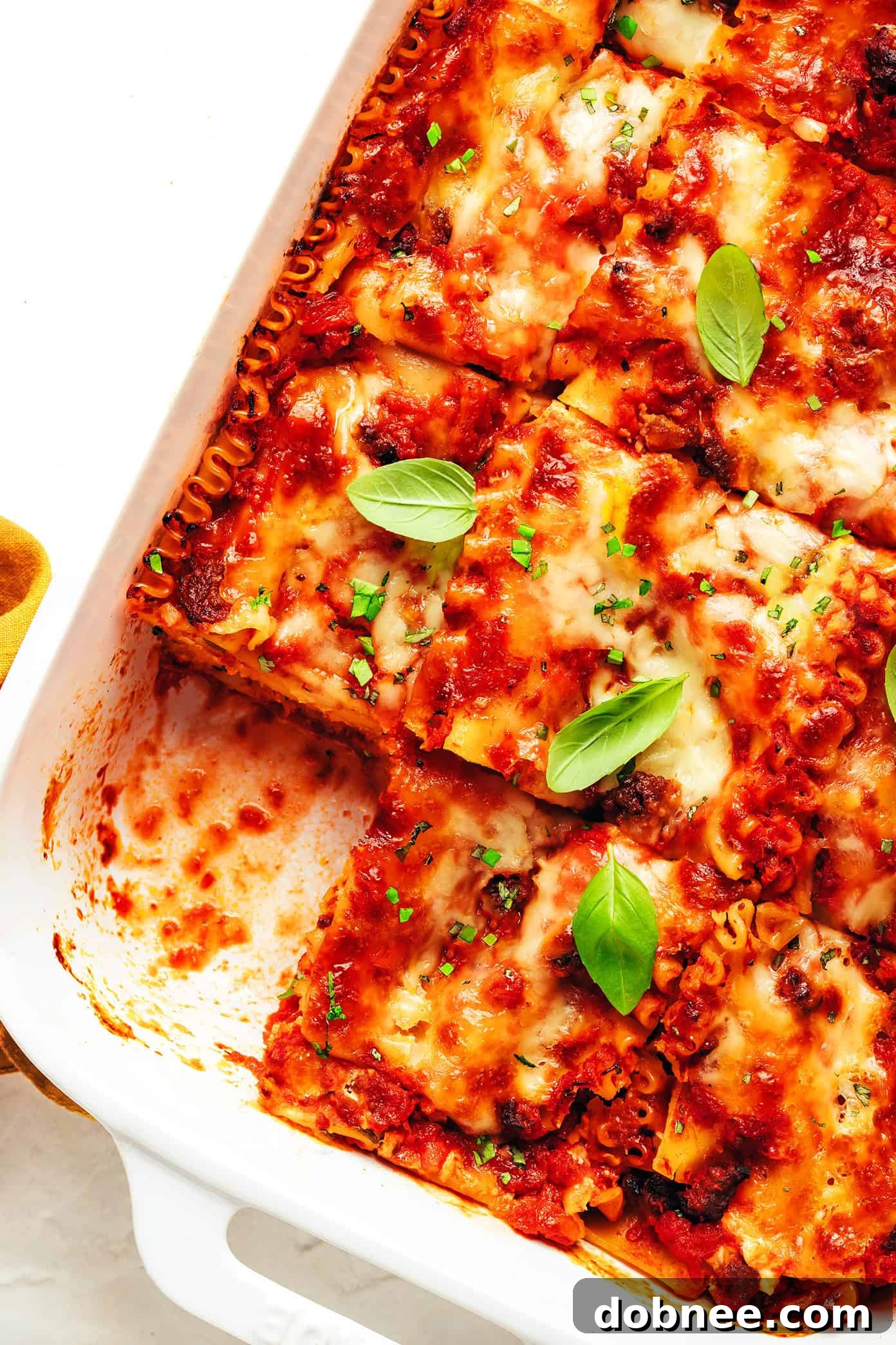 Delicious homemade lasagna with layers of rich sauce, pasta, and cheese, freshly baked.