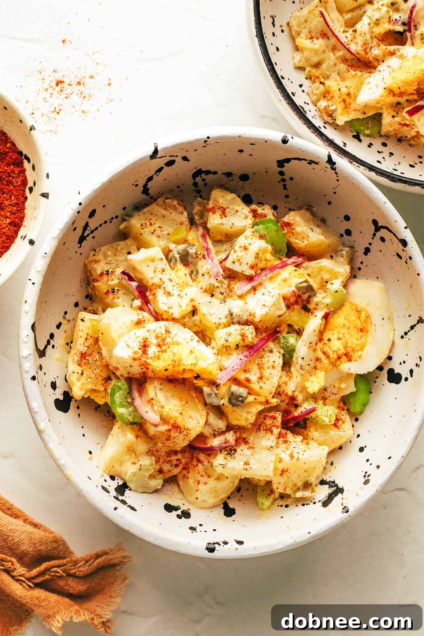 The best potato salad in a small serving bowl