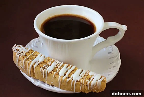 Delicious Pumpkin Pie Biscotti with a light chocolate drizzle, perfect for fall baking.