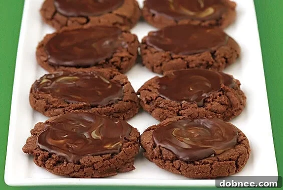 Close-up of freshly baked Chocolate Mint Puddles cookies with melted Andes mint centers