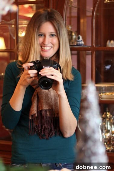 Friends Lisa and Megan smiling and enjoying the Kansas City Food Bloggers' Cookie Exchange, capturing the spirit of community and shared passion.