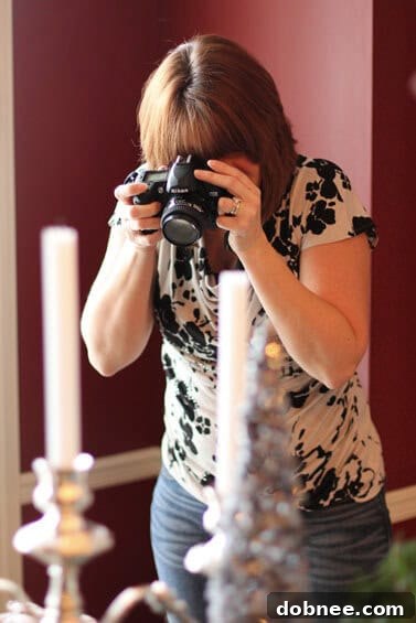Sandie, a Kansas City food blogger, thoughtfully capturing photos of the exquisite food and cookies at the exchange, a common sight at blogger gatherings.