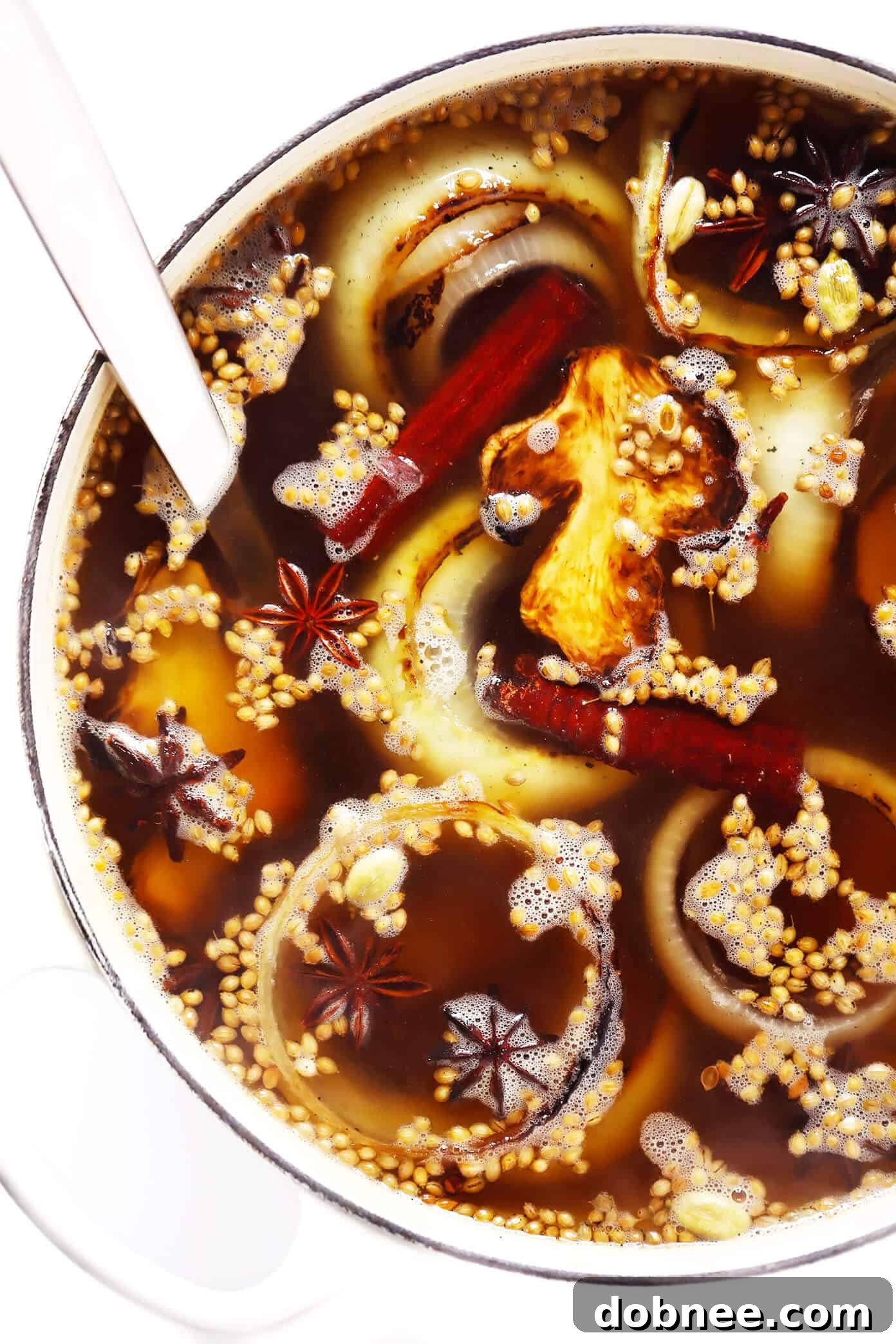 Homemade Pho Broth simmering in a large pot