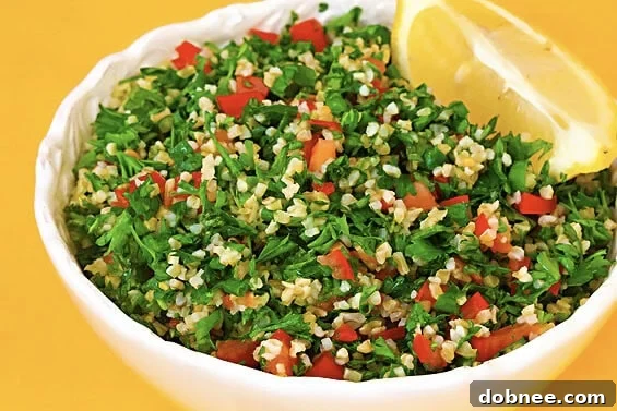 This classic tabbouleh recipe is easy to make with tons of fresh herbs, lemon and bulgur, and it always tastes SO refreshing! | gimmesomeoven.com