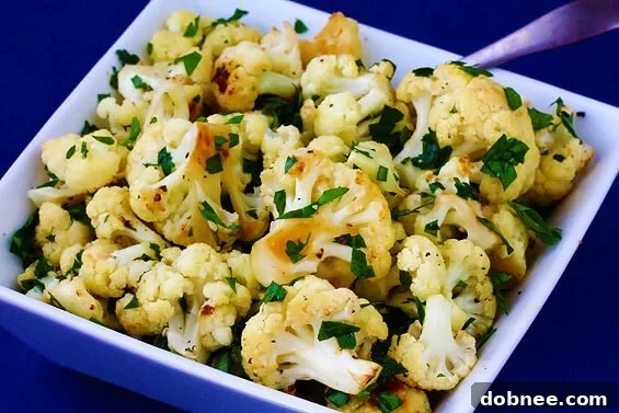 Delicious Garlic Roasted Cauliflower, perfectly caramelized and ready to serve.