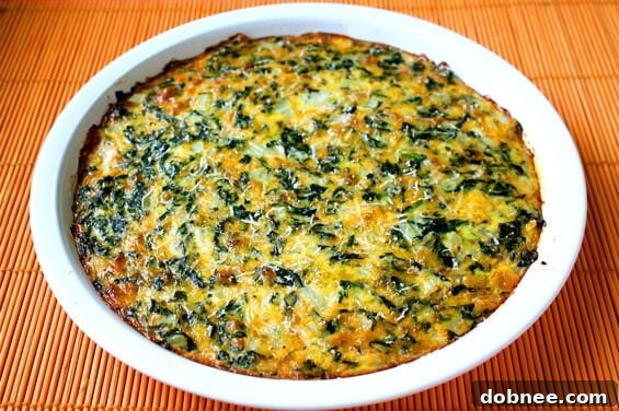 crustless-spinach-quiche-whole Full Crustless Spinach Quiche on a table, ready to be served