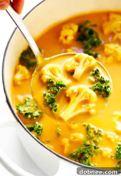 A prepared serving of cozy cauliflower curry with rice.