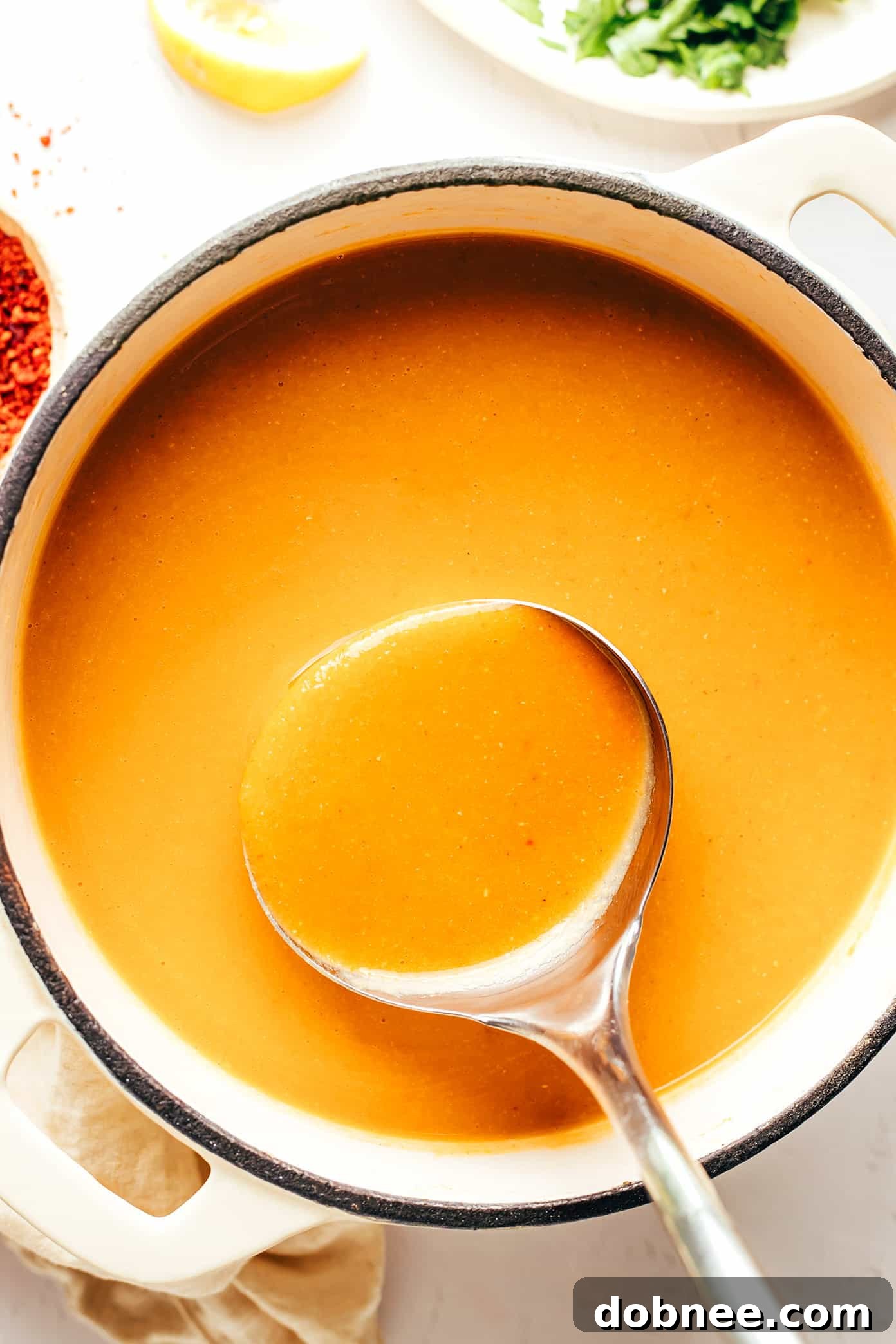 Turkish Lentil Soup simmering in a large pot
