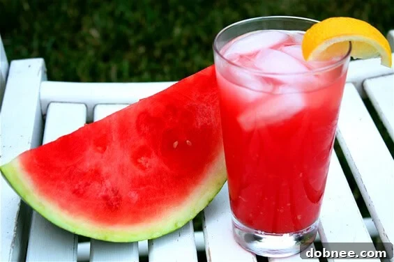 Watermelon Lemonade in a glass with watermelon slice