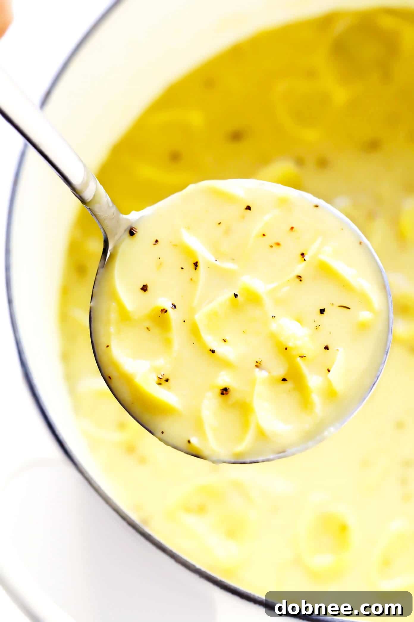 Lemony Artichoke Soup, a quick and easy recipe made with pantry staples, featuring bright lemon and tender artichoke hearts.