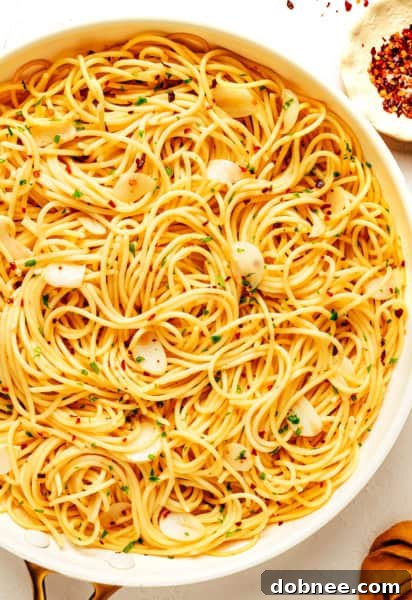 Spaghetti Aglio e Olio with parsley and cheese