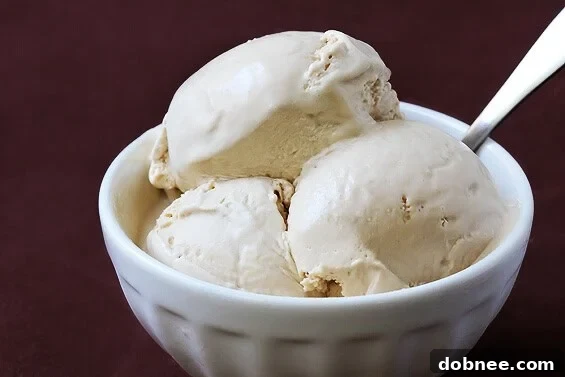 Scoop of creamy Earl Grey Ice Cream with tea leaves